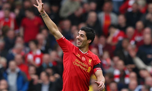 Suarez thời đỉnh cao là cầu thủ rất được yêu thích tại Liverpool. Ảnh: Reuters